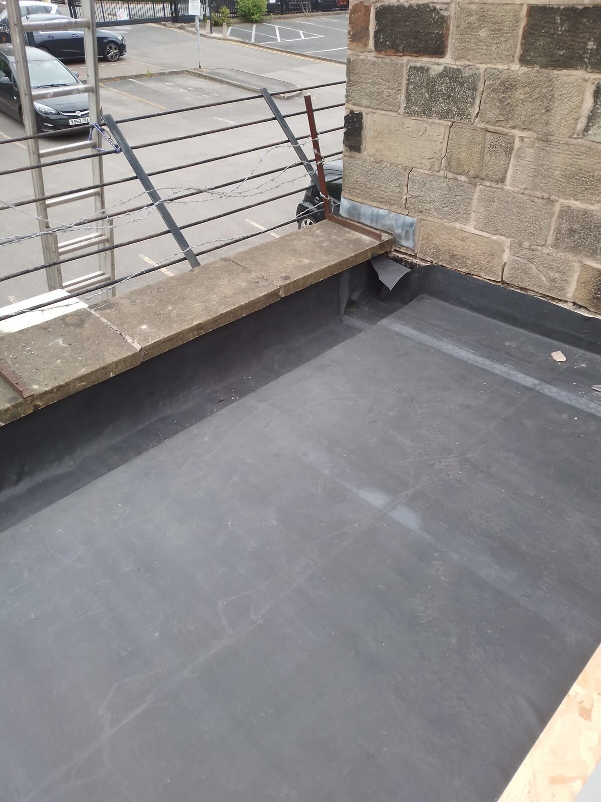 Slate roof close-up overlooking town